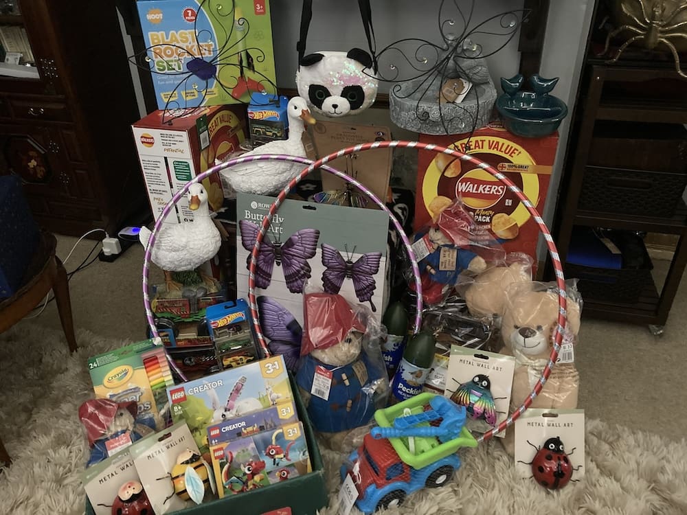 Raffle prize display of toys, hula hoops and ornaments at a RAGS fundraiser