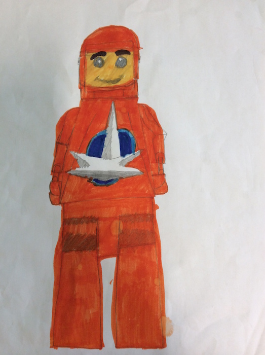 Child's coloured pencil drawing of a Lego-style astronaut figure