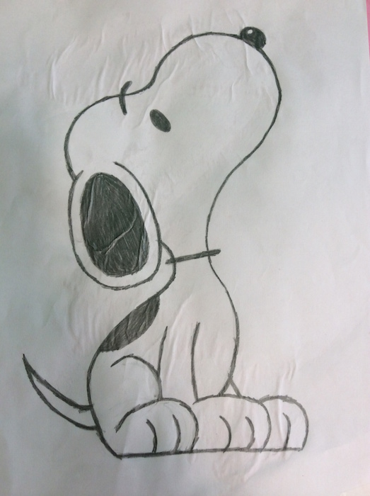Child's pencil drawing of Snoopy the cartoon dog